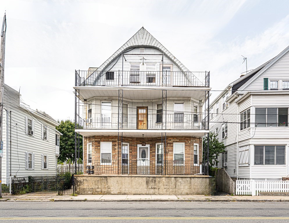 a front view of a large white building