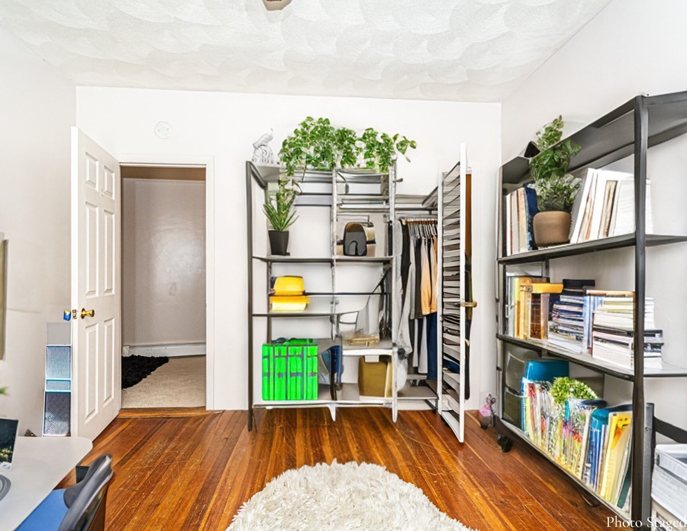 98 Margin Street Salem, MA 01970 - Photo 16 of 17 a view of an entryway with wooden floor