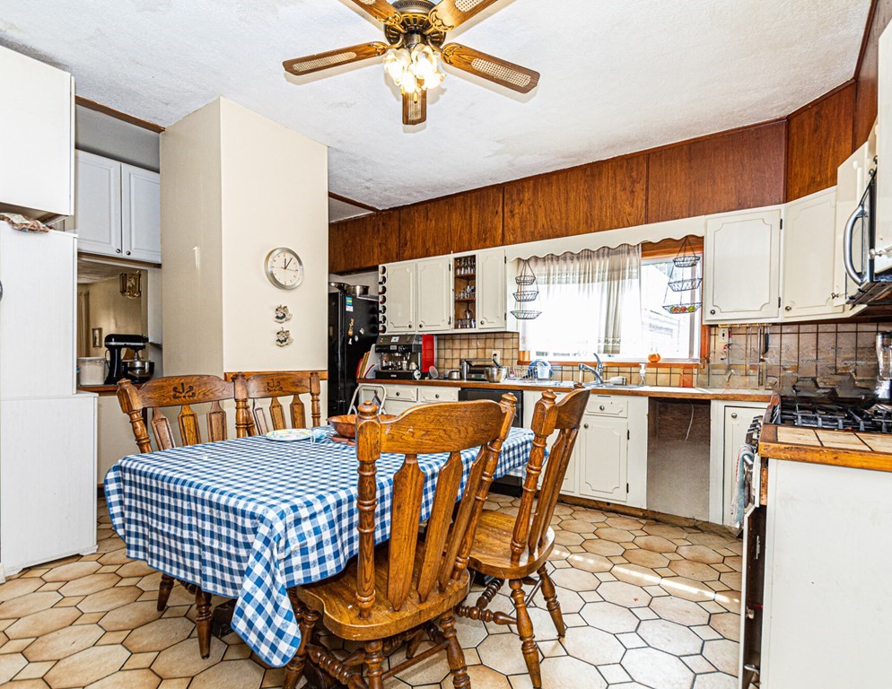 98 Margin Street Salem, MA 01970 - Photo 4 of 17 a outdoor dining space with furniture and view kitchen
