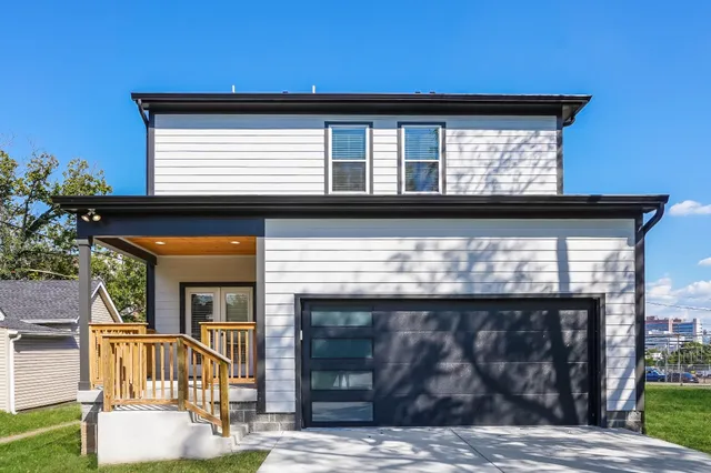 a view of house with balcony