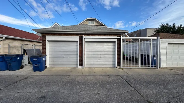 a front view of a house with a garage