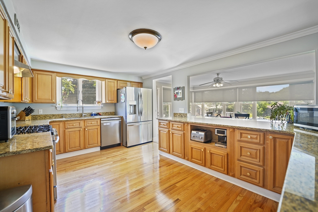 152 Alden Road Fairhaven, MA 02719 - Photo 12 of 29 a large kitchen with stainless steel appliances granite countertop a stove and a sink