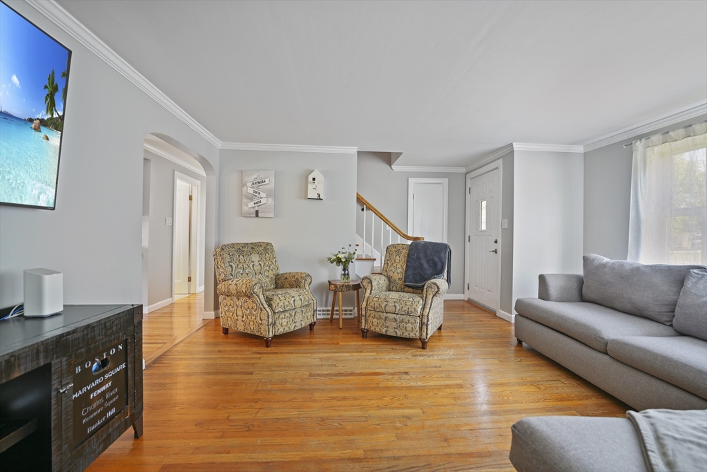 152 Alden Road Fairhaven, MA 02719 - Photo 15 of 29 a living room with furniture and a wooden floor