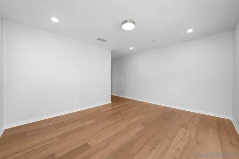 a bathroom with a shower and a sink