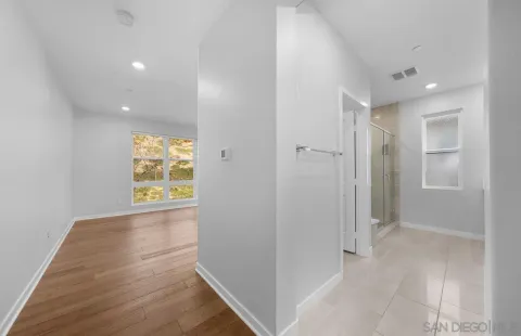 a view of cabinets and wooden floor