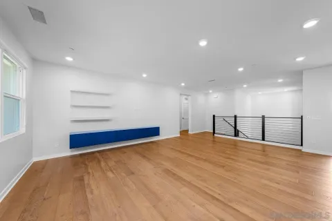 a view of an empty room and window