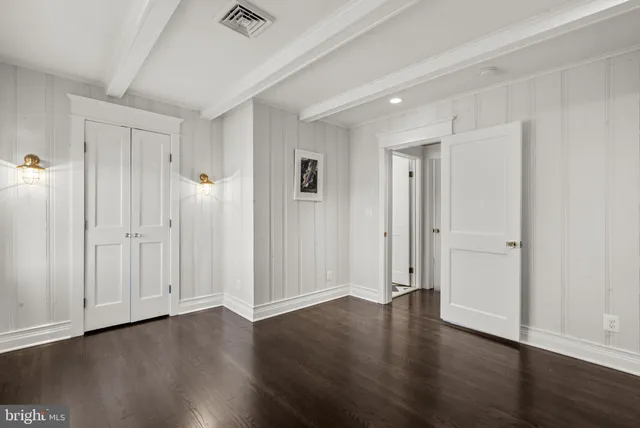 a view of a livingroom with wooden floor