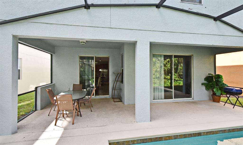 8878 Candy Palm Road Kissimmee, FL 34747 - Photo 22 of 70 a view of a porch with seating space