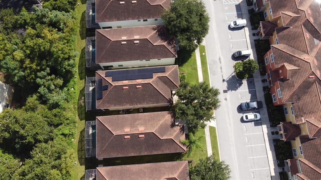 8878 Candy Palm Road Kissimmee, FL 34747 - Photo 70 of 70 an aerial view of a house with a yard