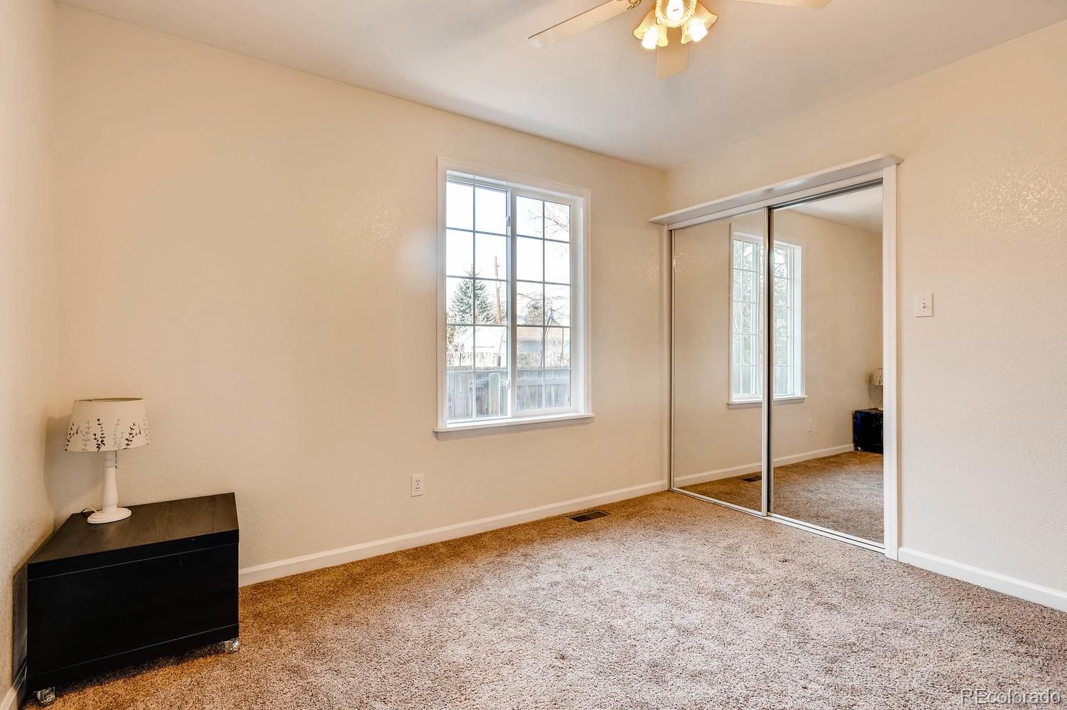 303 West Baseline Road Lafayette, CO 80026 - Photo 16 of 28 a view of an empty room with a window