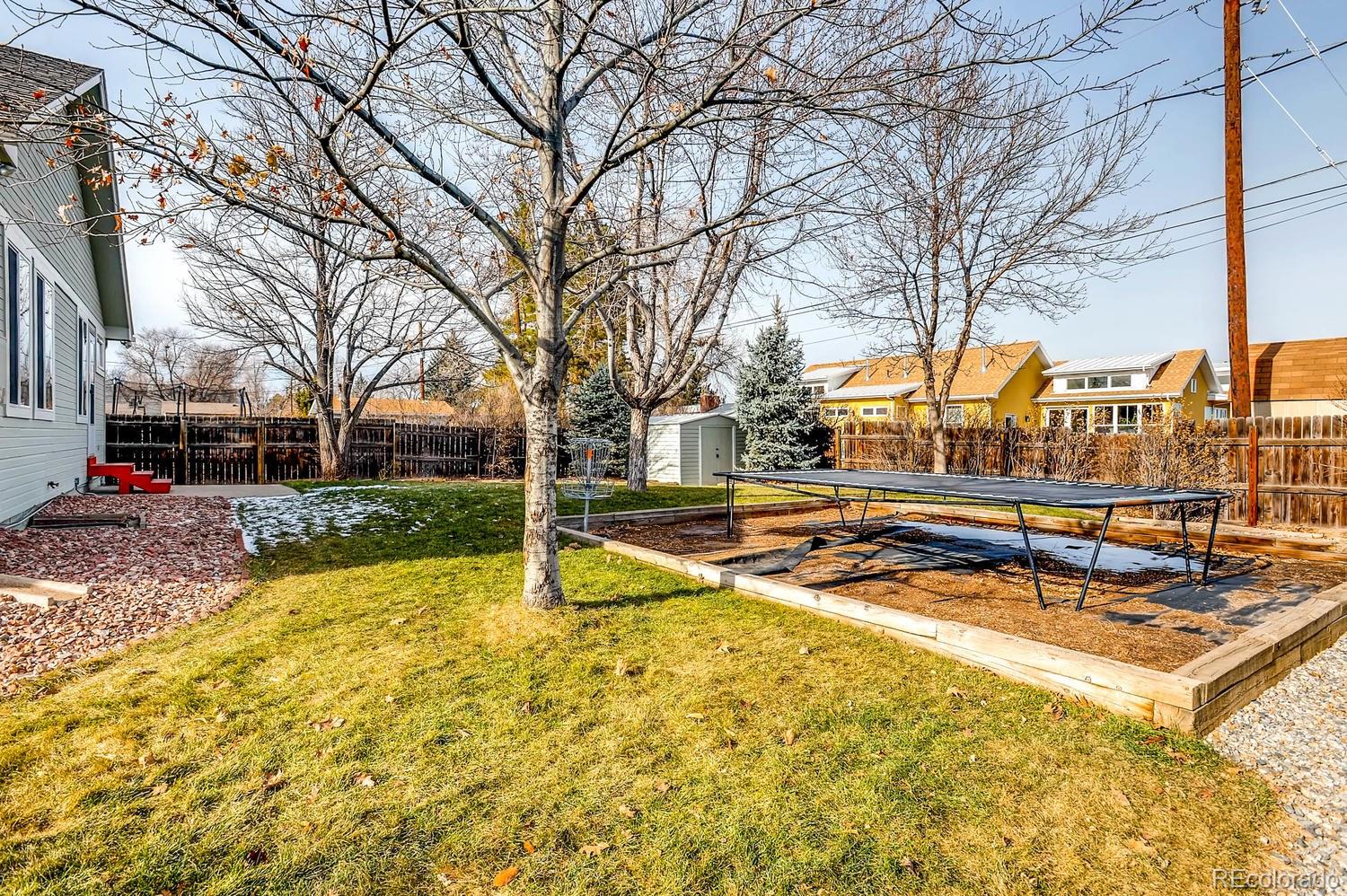 303 West Baseline Road Lafayette, CO 80026 - Photo 25 of 28 a view of a swimming pool with a patio