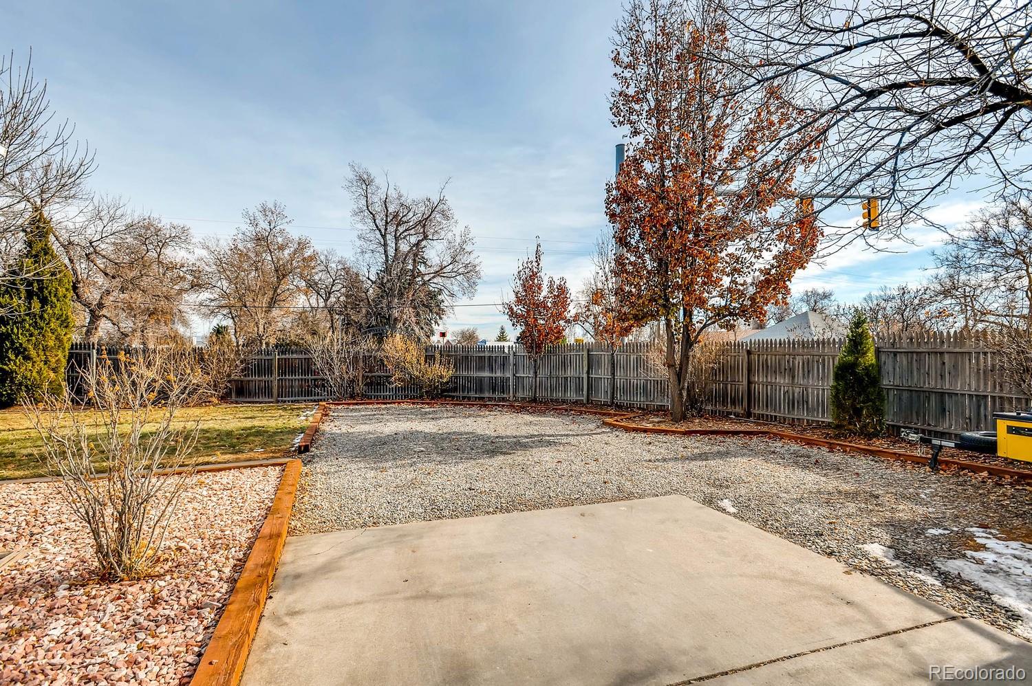 303 West Baseline Road Lafayette, CO 80026 - Photo 28 of 28 a view of a yard with plants and trees