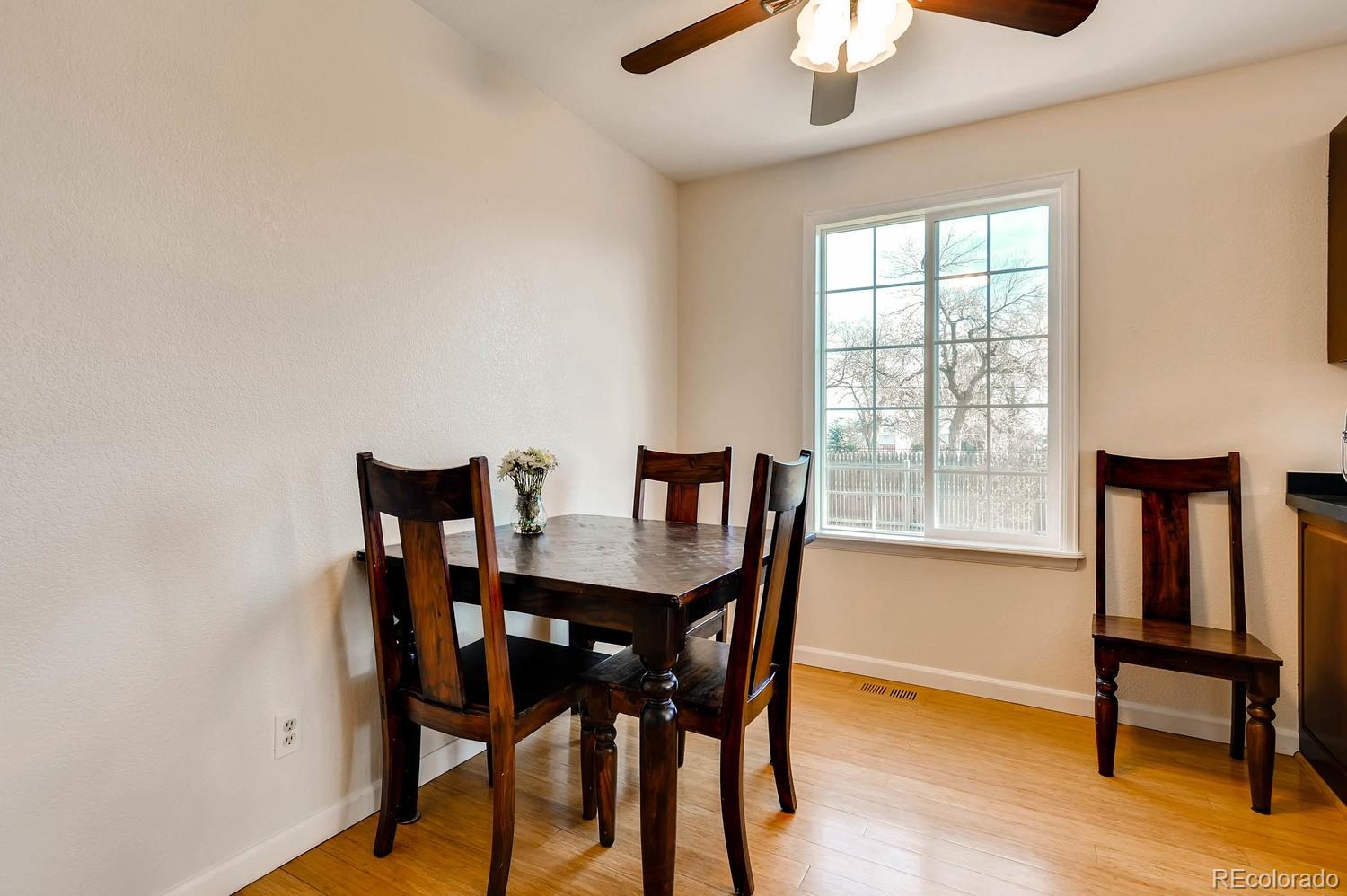 303 West Baseline Road Lafayette, CO 80026 - Photo 6 of 28 a view of a dining room with furniture and a window
