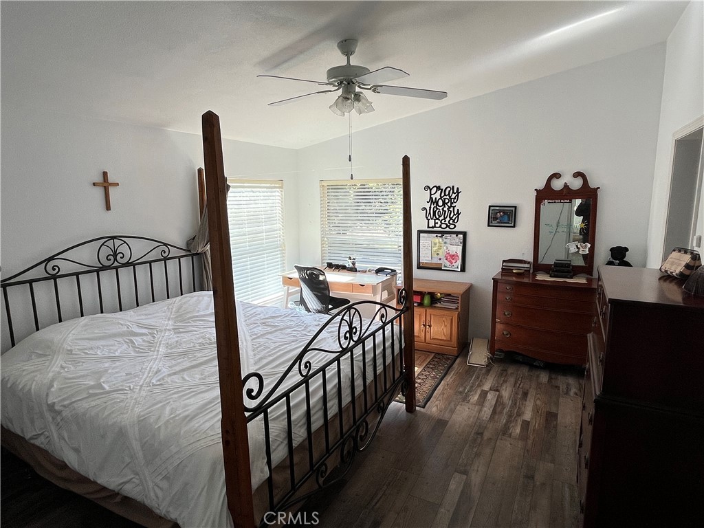 39950 7 Oaks Road, Unit 41 Angelus Oaks, CA 92305 - Photo 16 of 27 a bedroom with furniture and a window