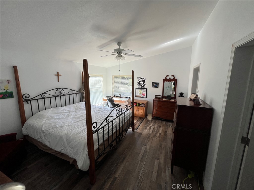 39950 7 Oaks Road, Unit 41 Angelus Oaks, CA 92305 - Photo 18 of 27 a bedroom with bed and a window