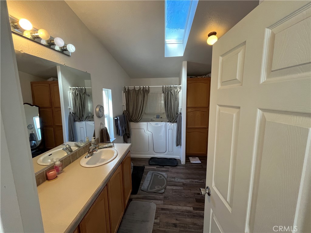 39950 7 Oaks Road, Unit 41 Angelus Oaks, CA 92305 - Photo 21 of 27 a bathroom with a sink and a mirror