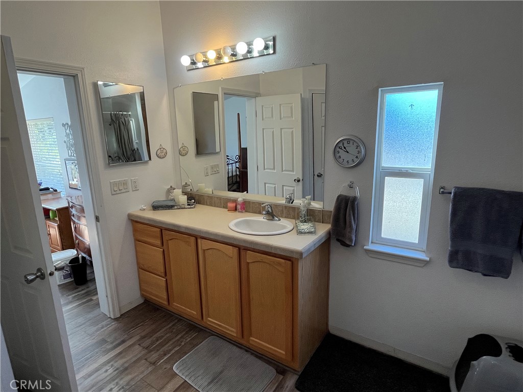 39950 7 Oaks Road, Unit 41 Angelus Oaks, CA 92305 - Photo 22 of 27 a bathroom with a sink double vanity and a mirror