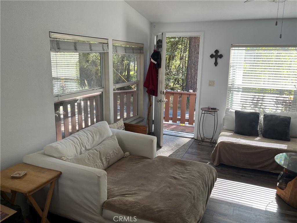 39950 7 Oaks Road, Unit 41 Angelus Oaks, CA 92305 - Photo 7 of 27 a living room with furniture and a window