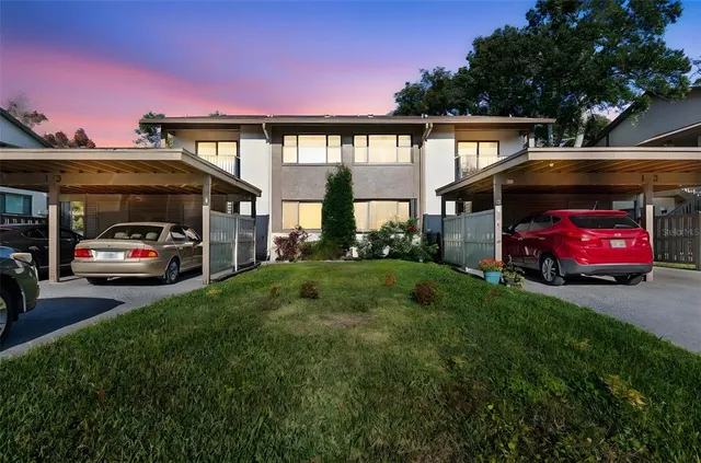 a view of a car parked in front of a house