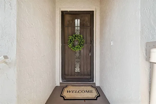 a view of a door and a window in a room
