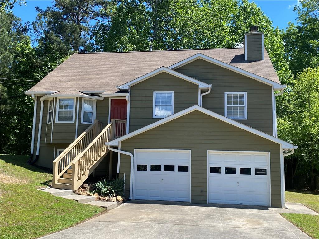803 Overlook Trail Canton, GA 30115 - Photo 1 of 1 a view of house with yard and sitting area