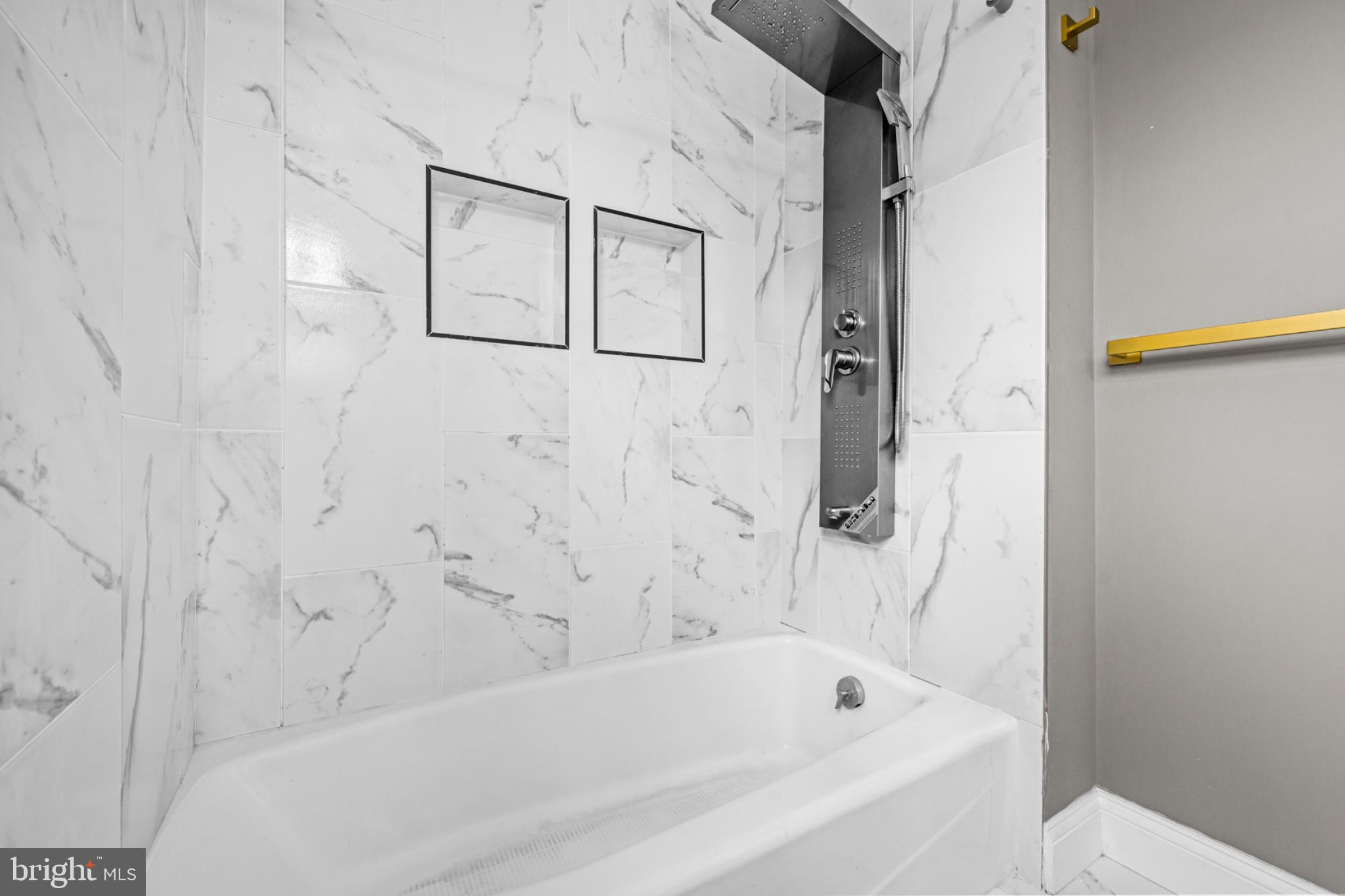 46 Boone Street Cumberland, MD 21502 - Photo 13 of 35 Sleek marble bath retreat awaits you.