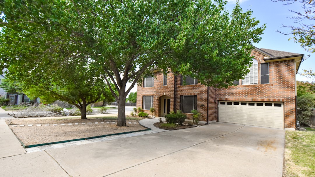 a view of a building with a tree
