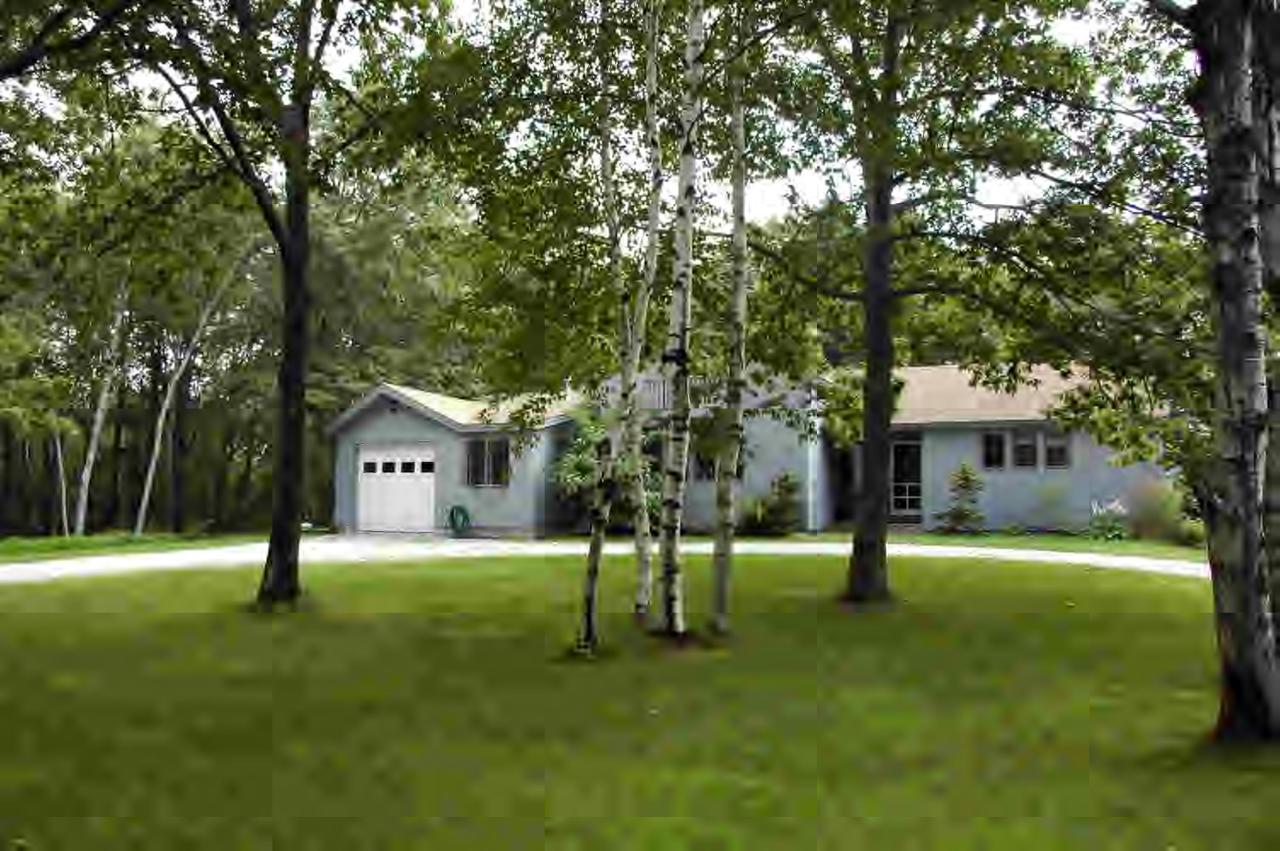 33 West Hubbard Road Sandisfield, MA 01255 - Photo 1 of 6 a view of a house with a yard and tree s
