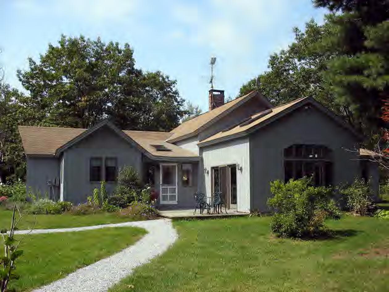 33 West Hubbard Road Sandisfield, MA 01255 - Photo 2 of 6 a front view of house with yard and green space