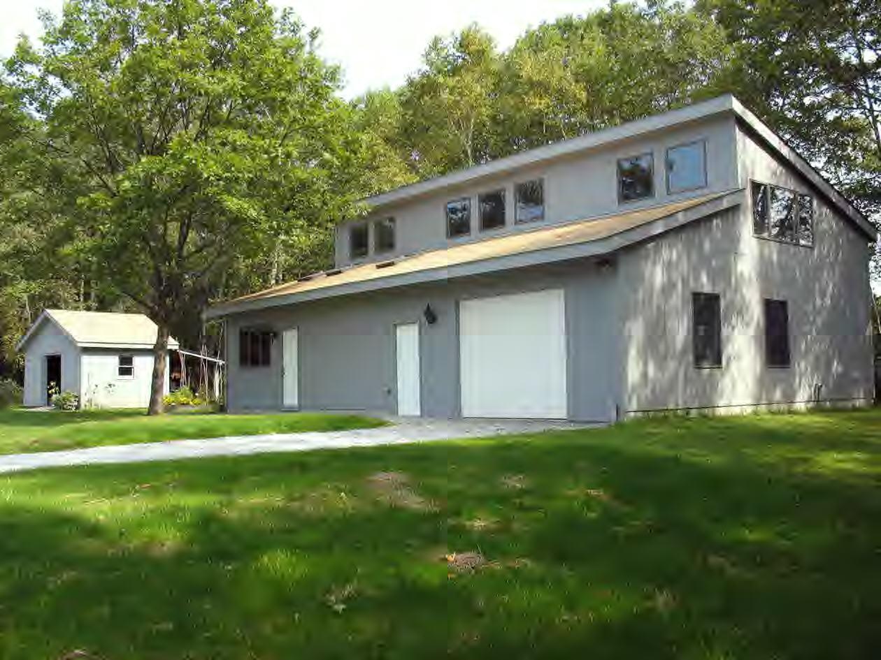 33 West Hubbard Road Sandisfield, MA 01255 - Photo 6 of 6 a front view of a house with a yard