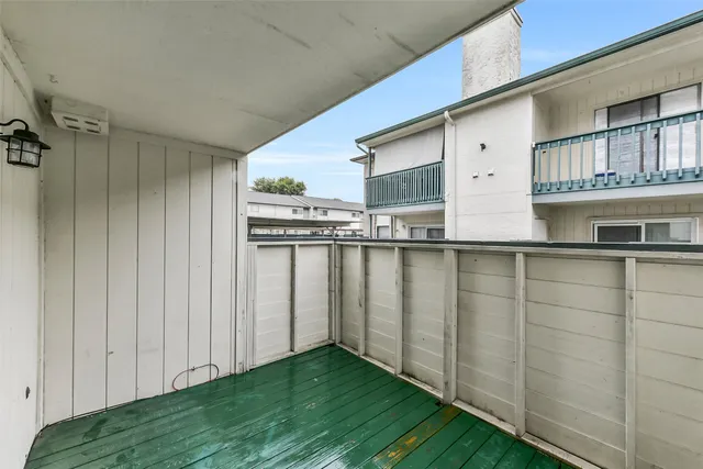 a view of a backyard of the house