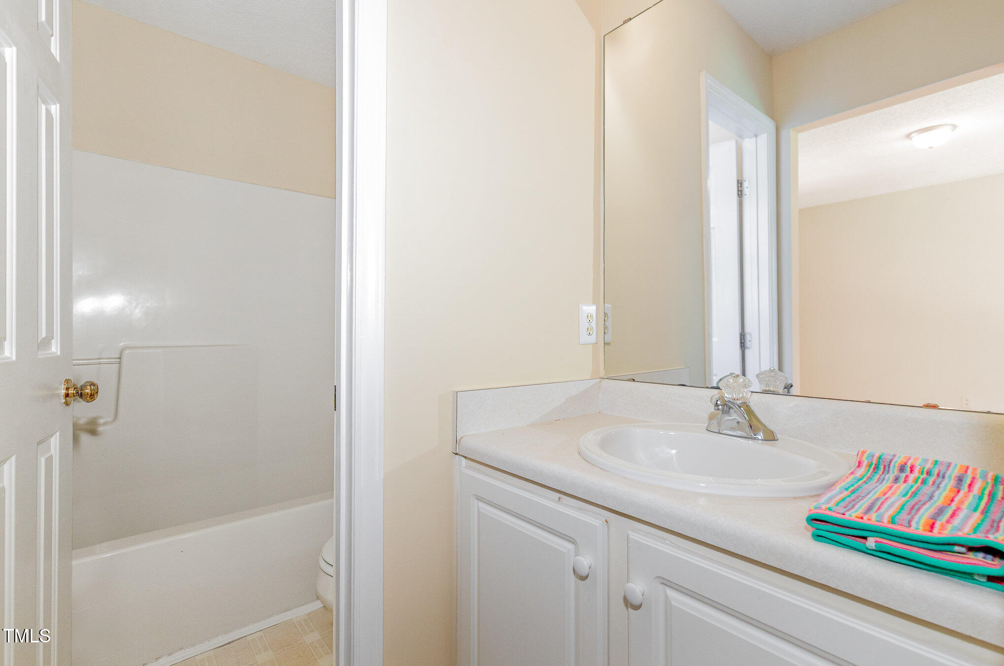 2125 Ventana Lane Raleigh, NC 27604 - Photo 11 of 19 a bathroom with a sink and a mirror