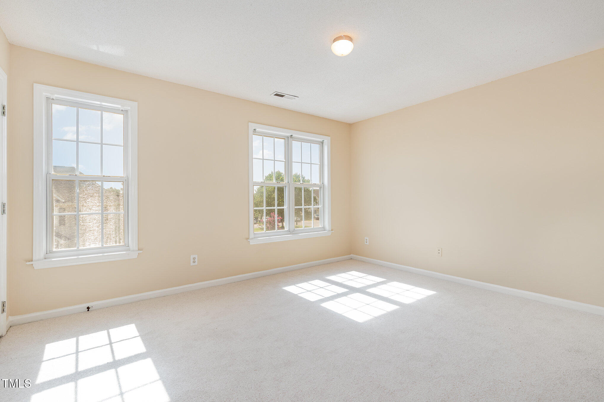 2125 Ventana Lane Raleigh, NC 27604 - Photo 14 of 19 a view of an empty room with a window