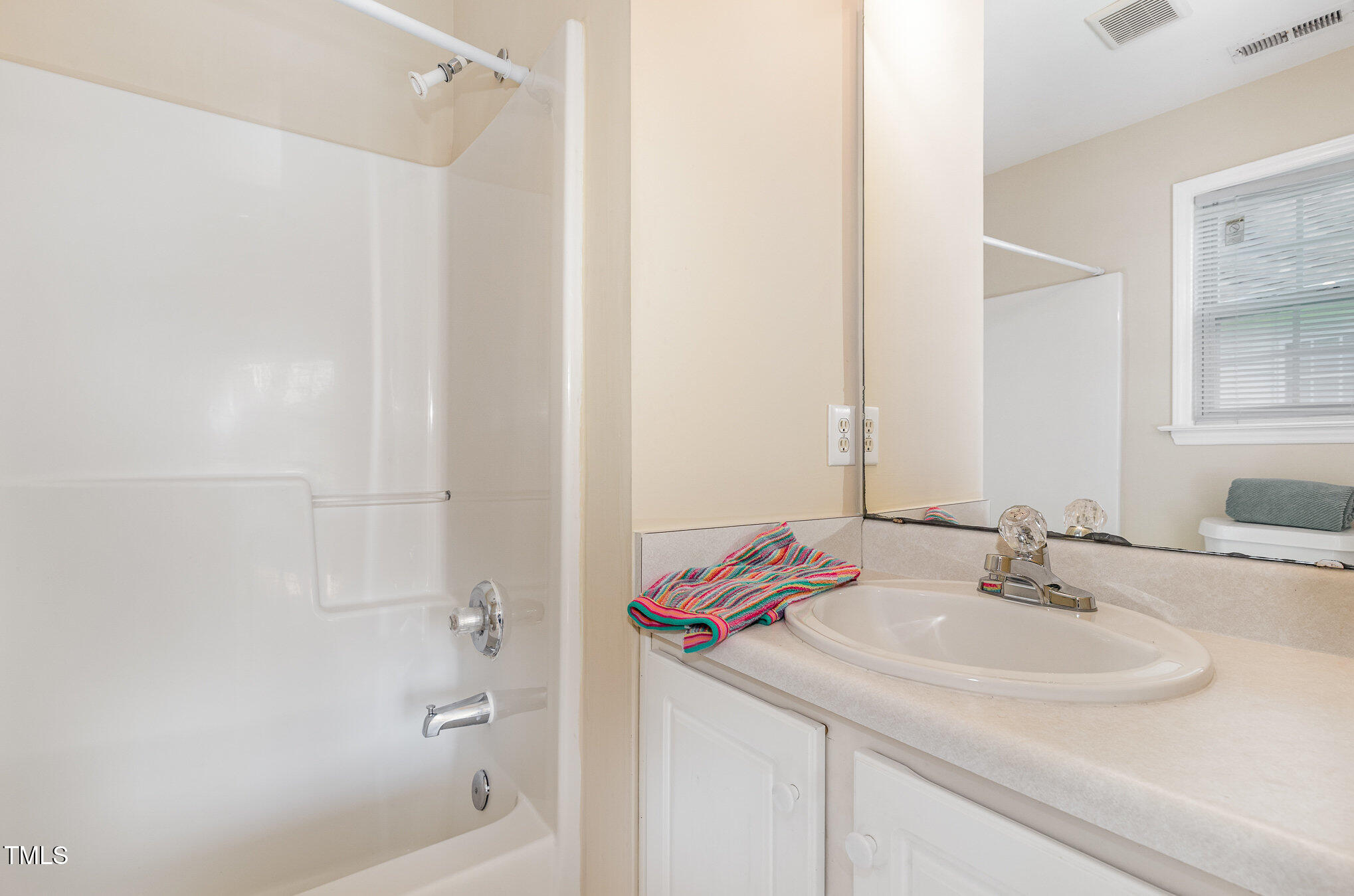 2125 Ventana Lane Raleigh, NC 27604 - Photo 15 of 19 a bathroom with a sink and a bathtub