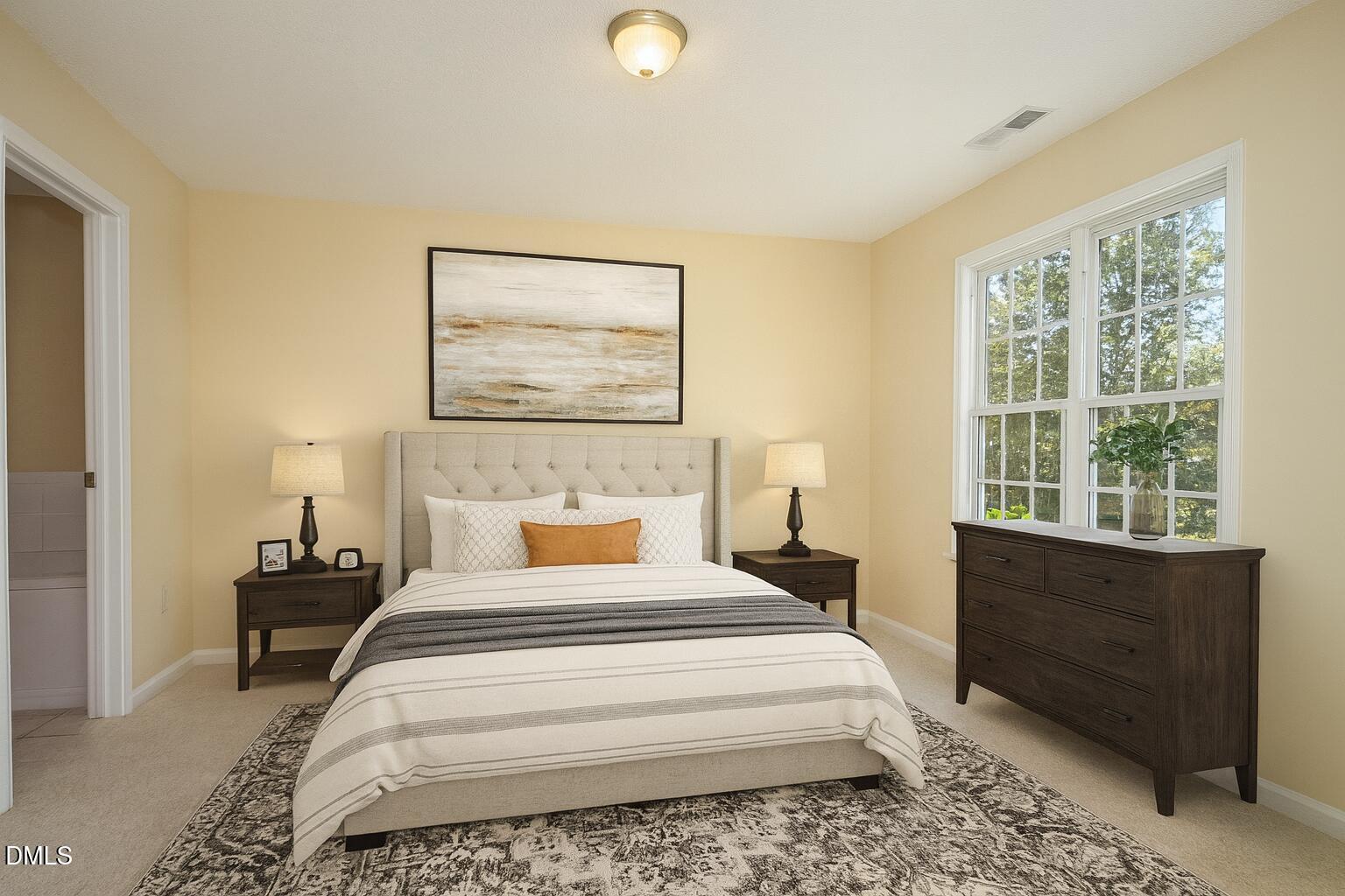 2125 Ventana Lane Raleigh, NC 27604 - Photo 10 of 19 a bedroom with a bed and a window