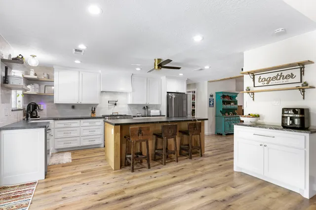 a view of living room with furniture and window