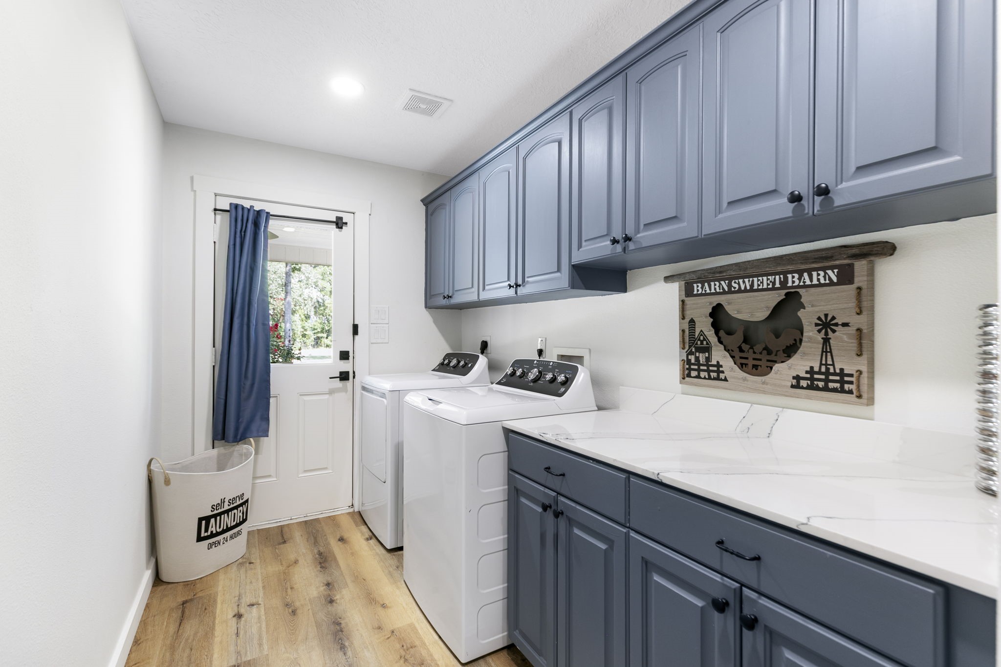 40418 Rolling Forest Drive Magnolia, TX 77354 - Photo 22 of 49 a view of a storage and utility room with wooden floor
