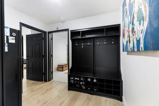 a living room with furniture and flat screen tv