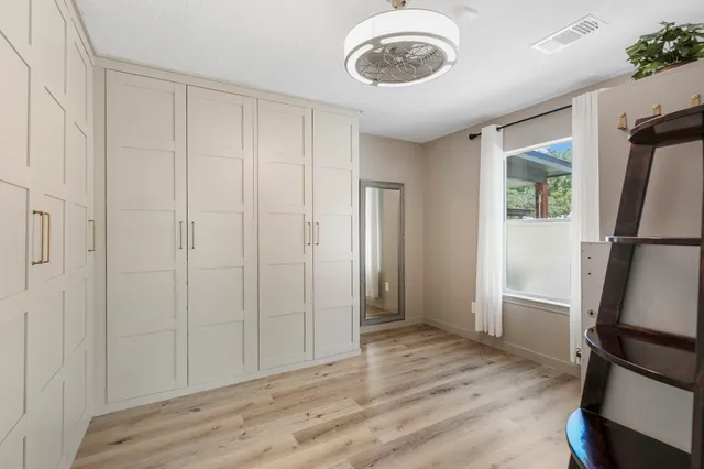 a view of small space with wooden floor