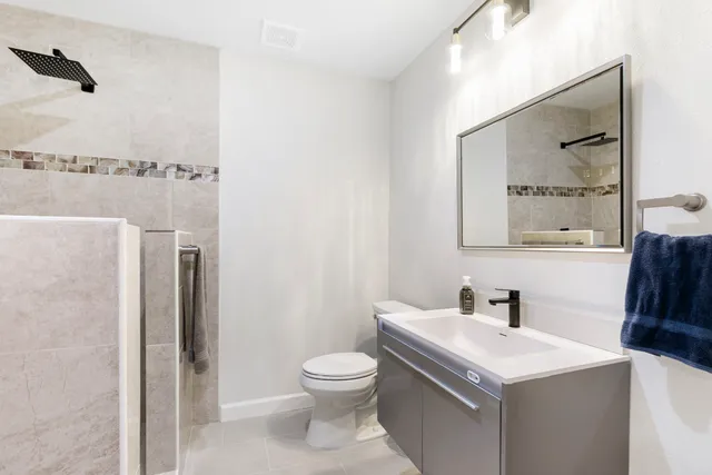 a room with furniture and gym equipment