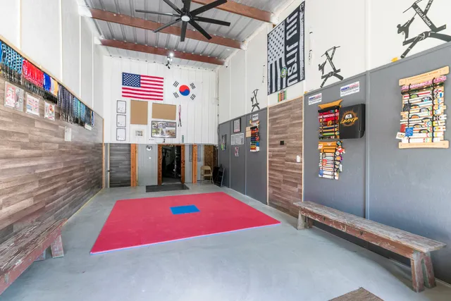 a view of a garage with cars