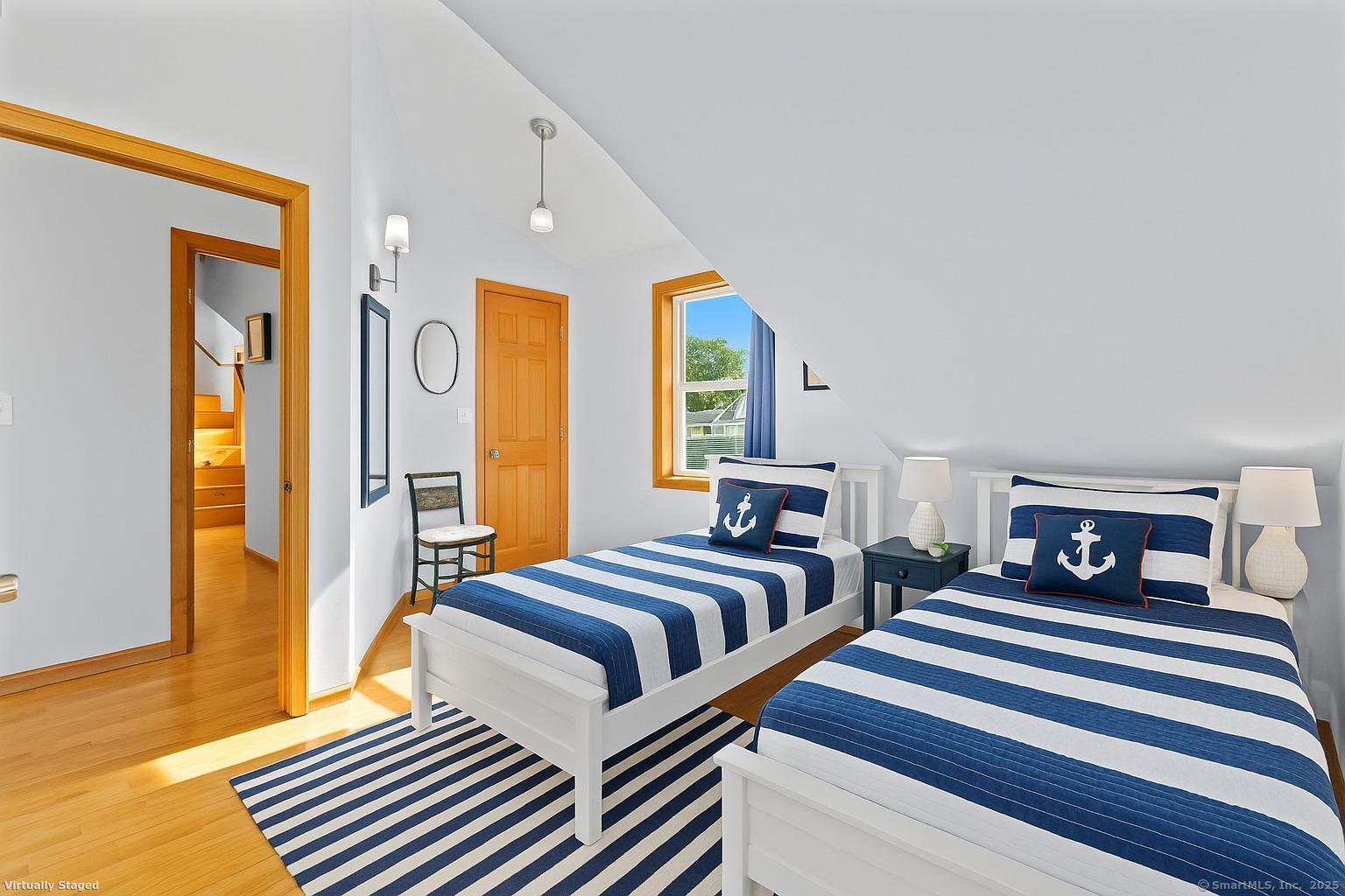 38 Elaine Road Milford, CT 06460 - Photo 4 of 13 a bedroom with bed and a window