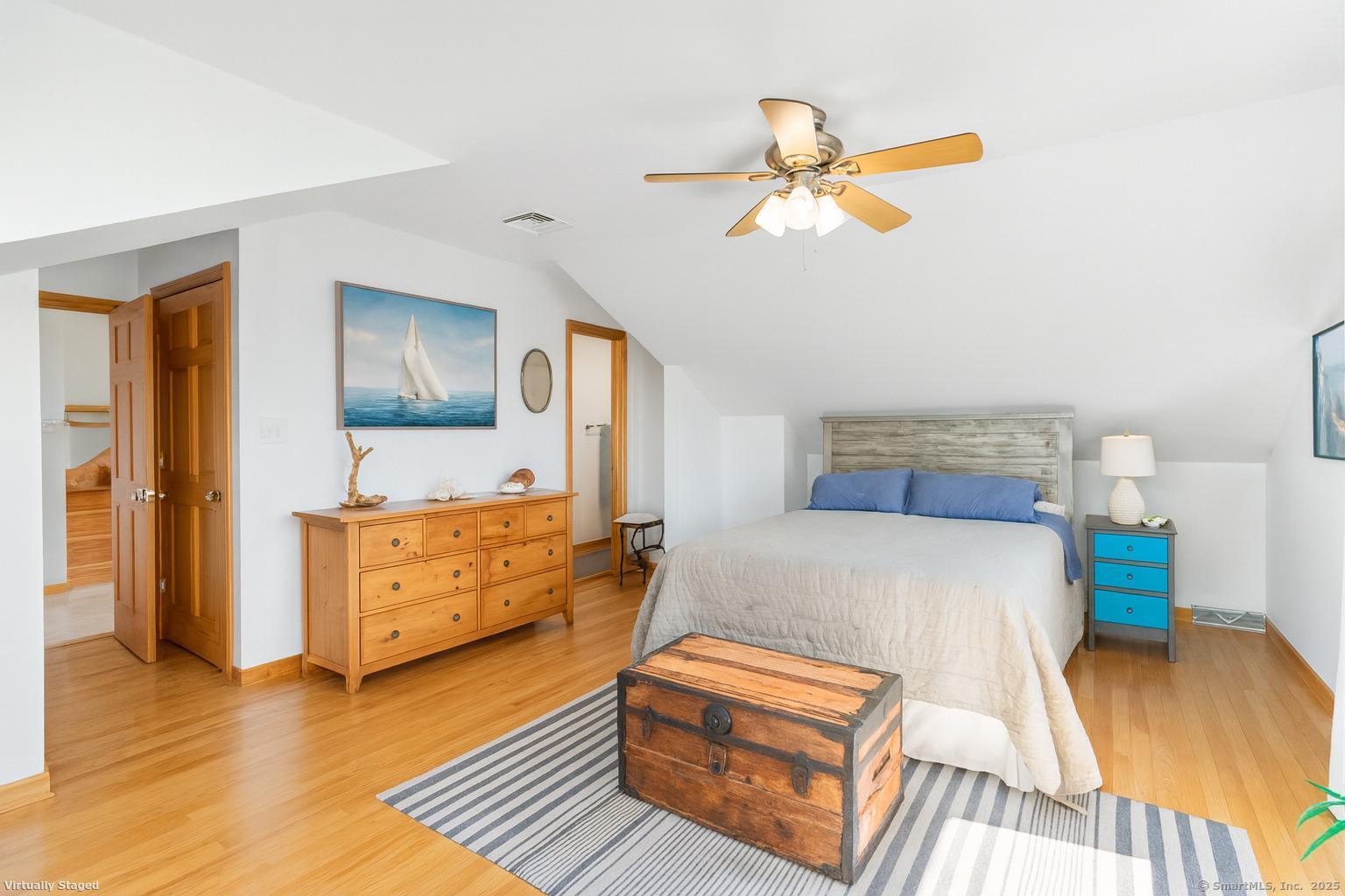 38 Elaine Road Milford, CT 06460 - Photo 6 of 13 a bedroom with a bed and a dresser