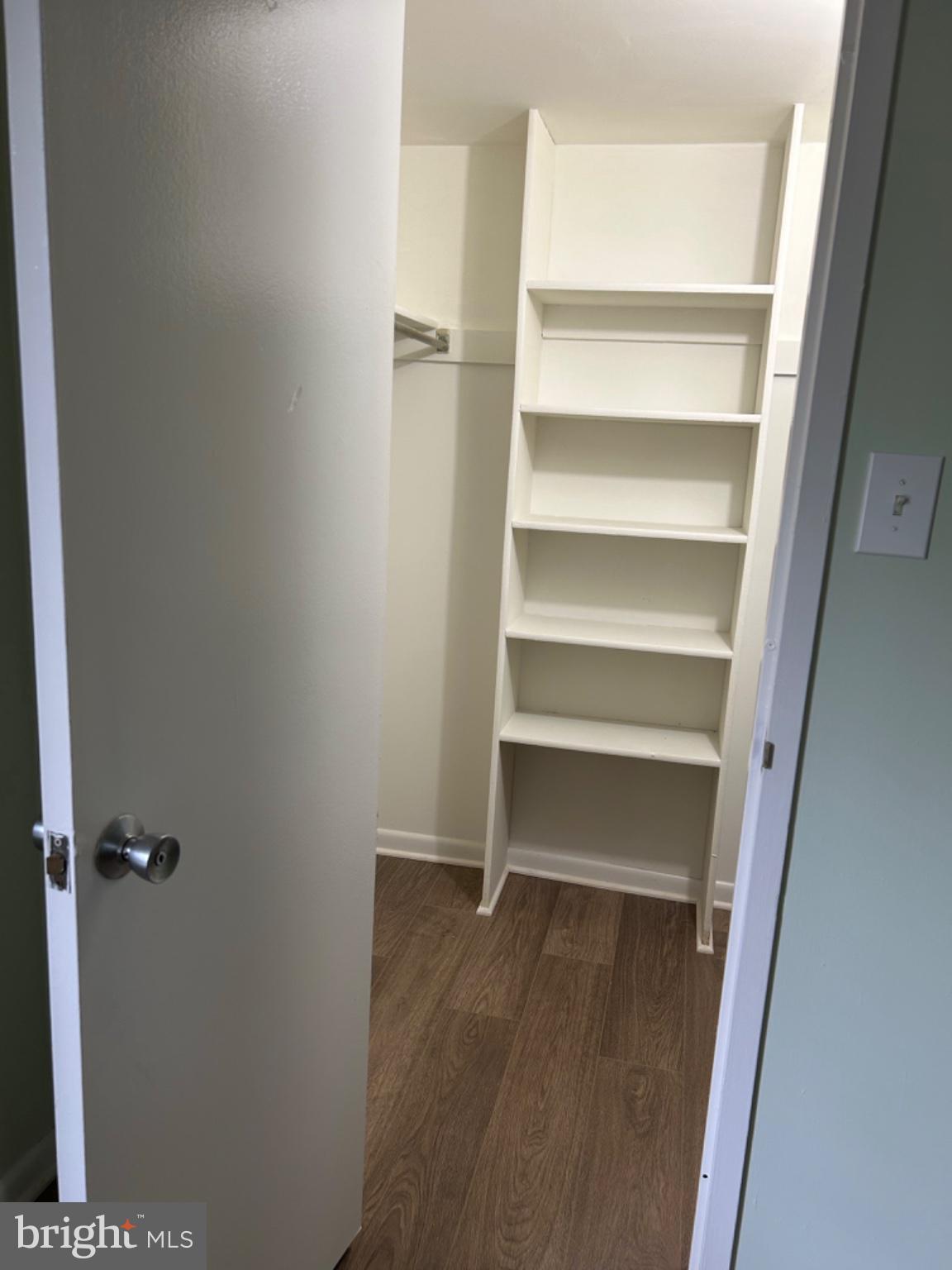11609 Stoneview Square, Unit 11C Reston, VA 20191 - Photo 25 of 30 Spacious closet with organized shelving.