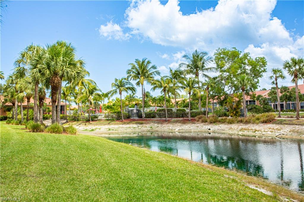 6760 Beach Resort Drive, Unit 2 Naples, FL 34114 - Photo 22 of 24 a view of lake