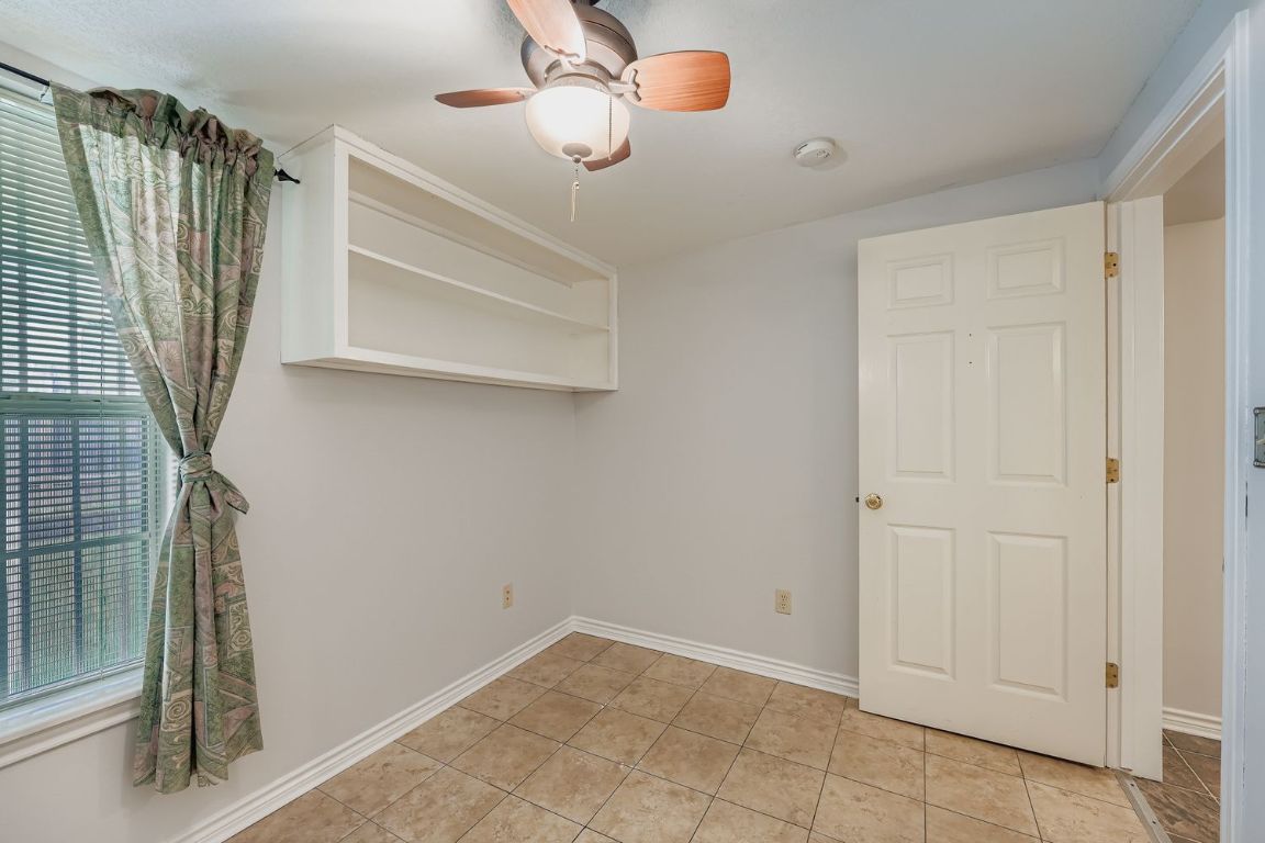 2308 Santa Rita Street Austin, TX 78702 - Photo 20 of 27 a view of an empty room with a window