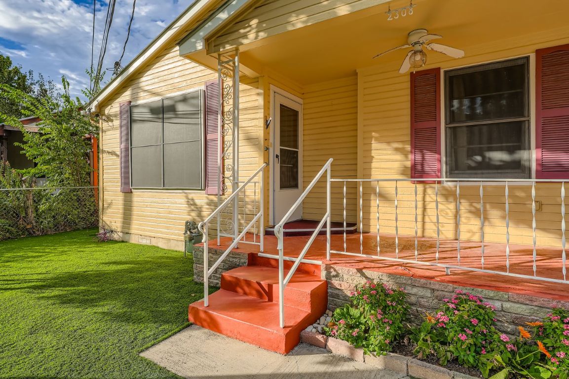 2308 Santa Rita Street Austin, TX 78702 - Photo 2 of 27 a view of a house with a backyard