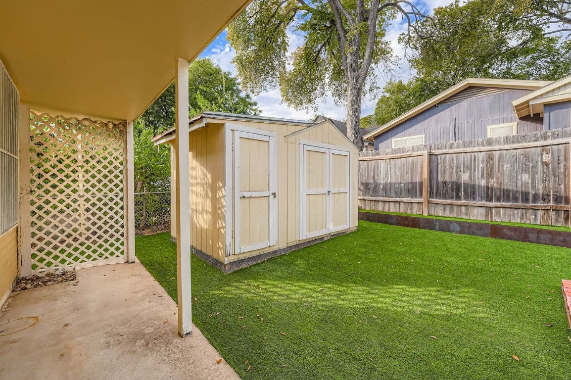 2308 Santa Rita Street Austin, TX 78702 - Photo 24 of 27 a view of a back yard of the house