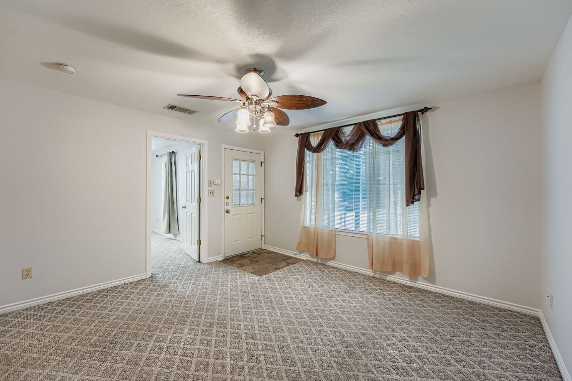 2308 Santa Rita Street Austin, TX 78702 - Photo 5 of 27 a view of an entryway with a chandelier