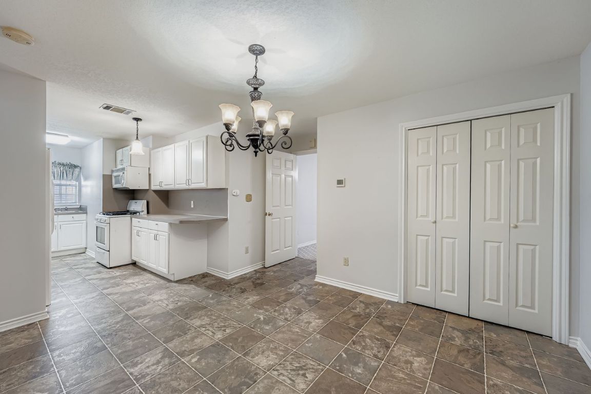 2308 Santa Rita Street Austin, TX 78702 - Photo 7 of 27 a view of a kitchen with a sink and cabinets